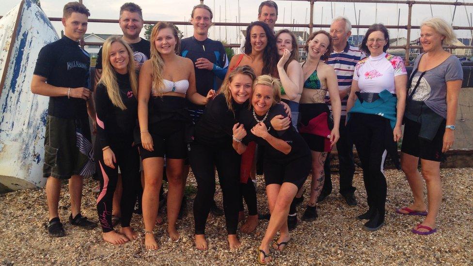 Wetsuit Outlet staff on the beach