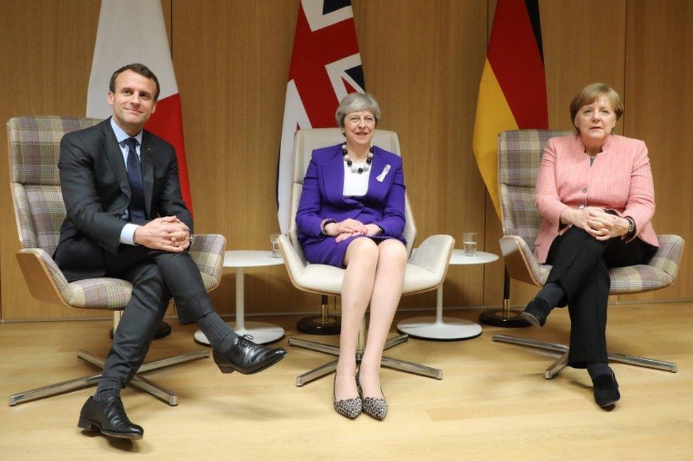 Theresa May, Emmanuel Macron and Angela Merkel