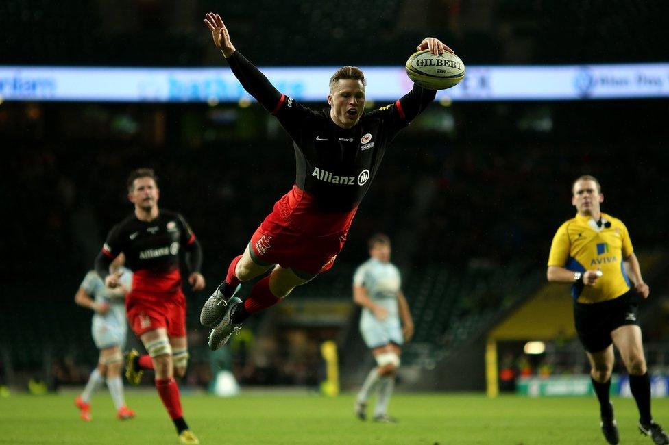 Chris Ashton of Saracens rugby team scores a try