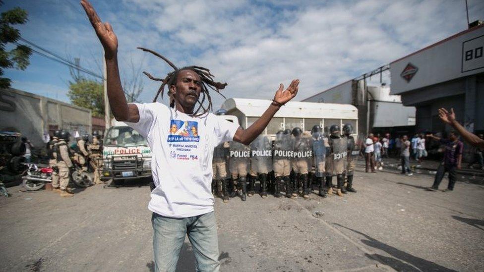 Supporters of the Fanmi Lavalas party presidential candidate, Maryse Narcisse, protest in Port-au-Prince, Haiti, 22 November 2016