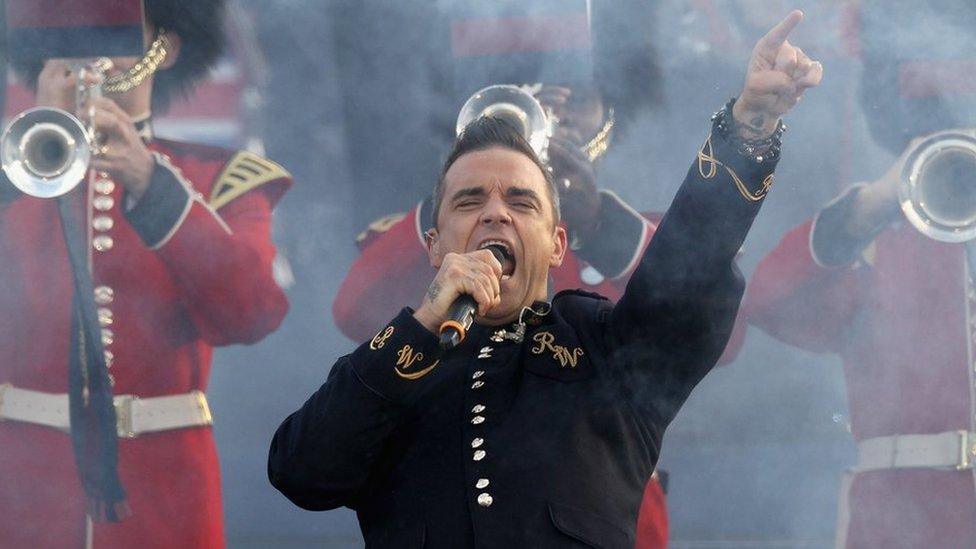 Singer Robbie Williams performs at the Diamond Jubilee concert at Buckingham Palace