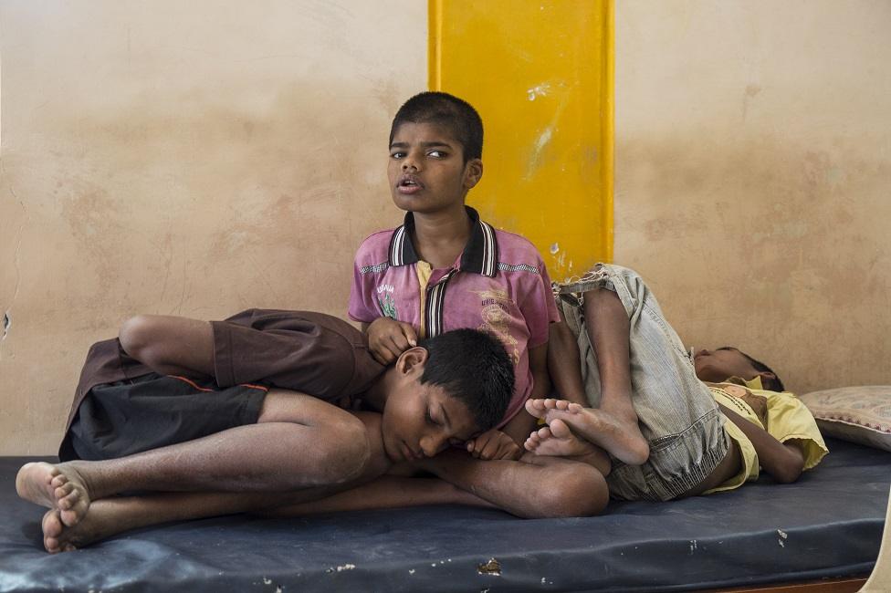 Three child patients in a hospital in India