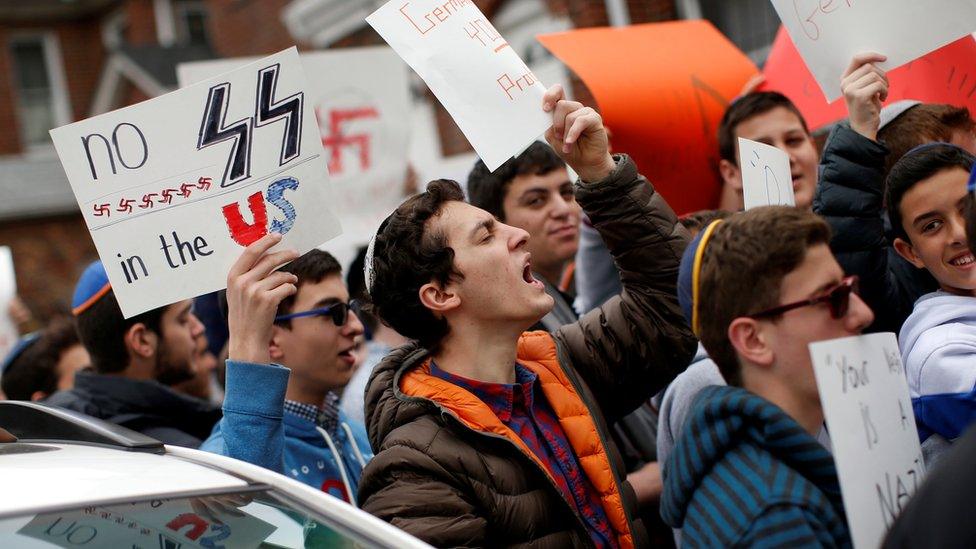 Students protest outside the home of Jakiw Palij in the Queens borough of New York City - 24 April 2017