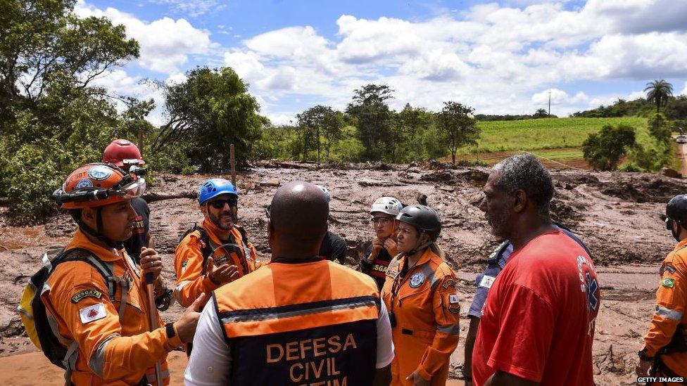 Rescue workers gather in Brazil