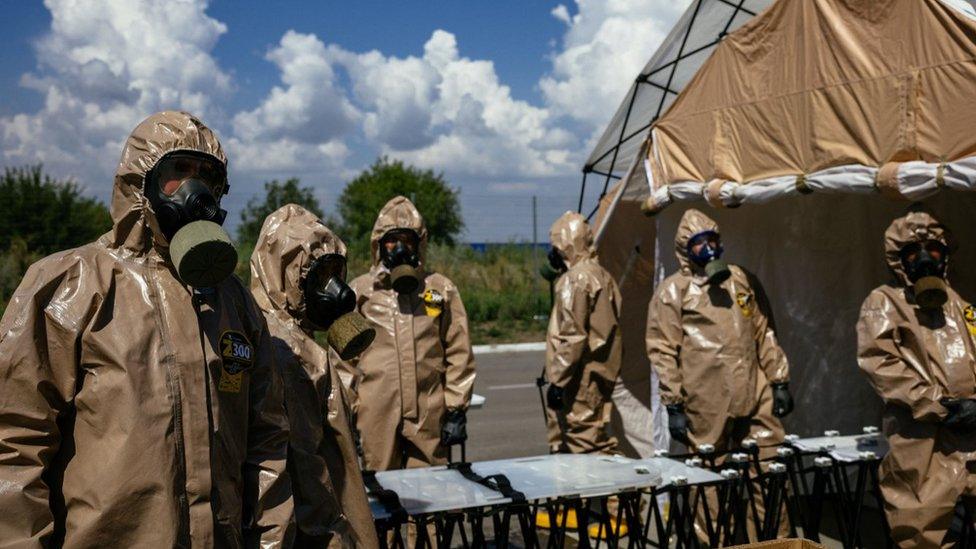 Ukrainian Emergency Ministry rescuers attend an exercise in the city of Zaporizhzhia 17 August 2022