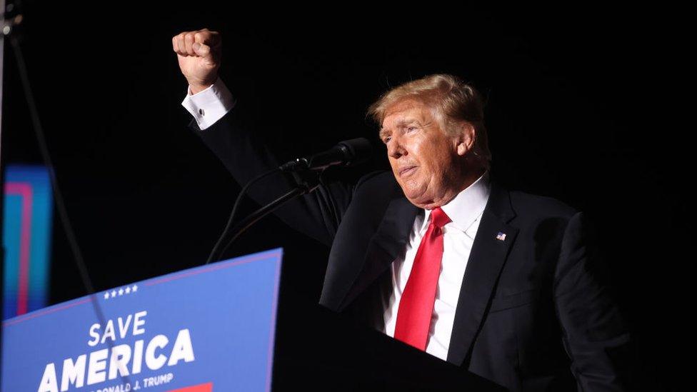 Donald Trump speaks to supporters at a rally in October 2021