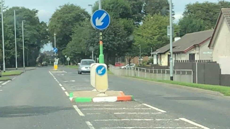 Graffiti on traffic island in Limavady.