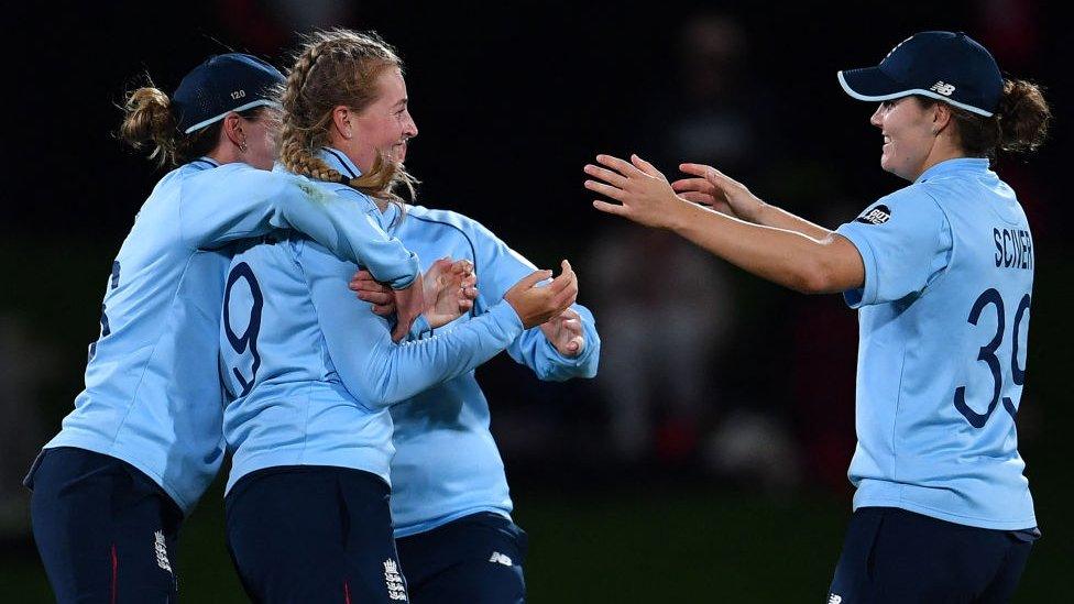 England celebrate a wicket