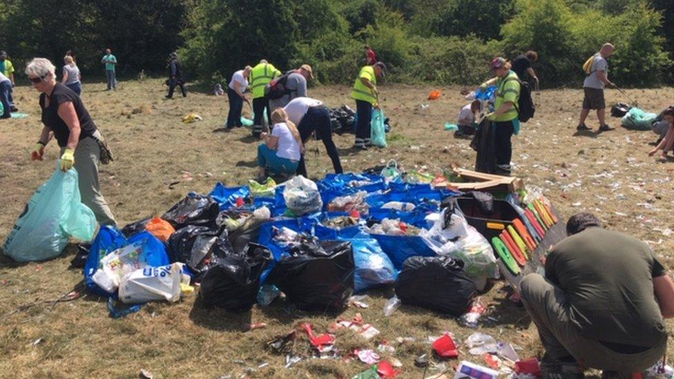 Volunteers clear bags of rubbish from the Daisy nook site