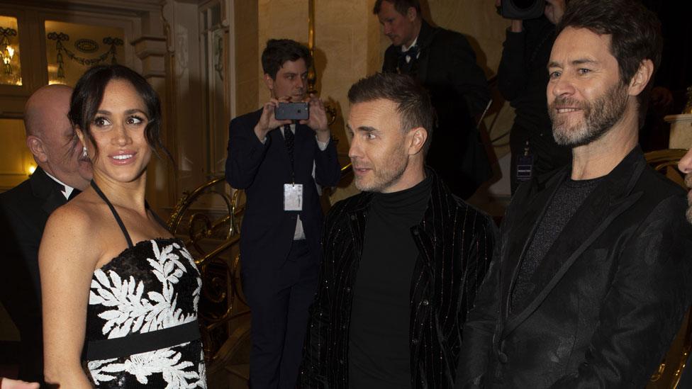 Meghan with members of Take That