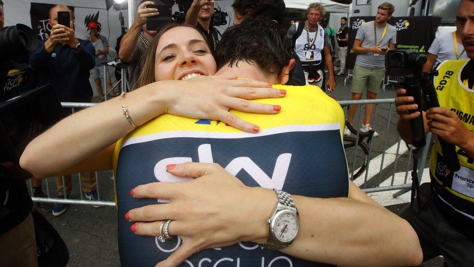 Thomas and wife Sara embrace at the end of stage 20 Tour de France