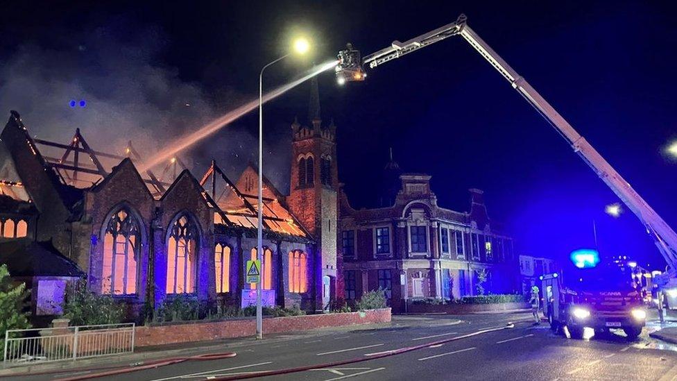 Firefighters at the scene in Grimsby Road