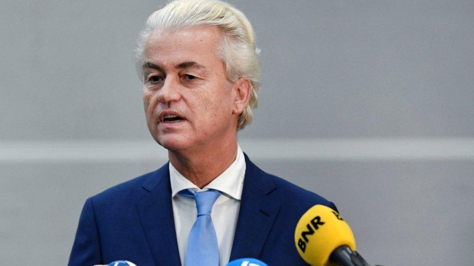 Dutch anti-Islam politician Geert Wilders speaks to the media following the verdict in his appeal in Schiphol near Amsterdam, Netherlands