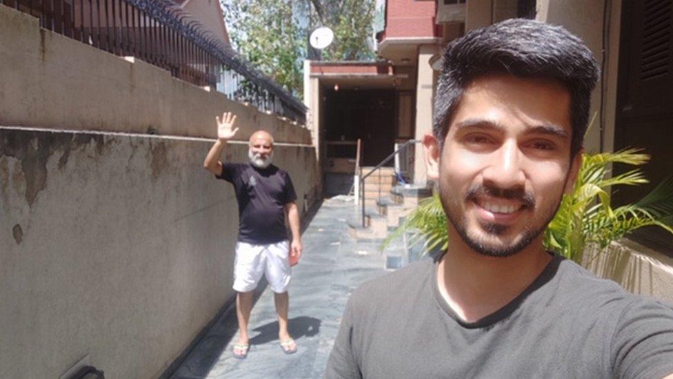 Dr. Barua and his landlord Mr Suri (left) outside their house in Delhi