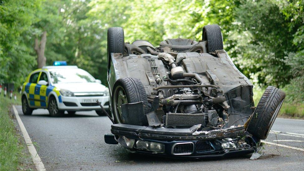 An upturned car