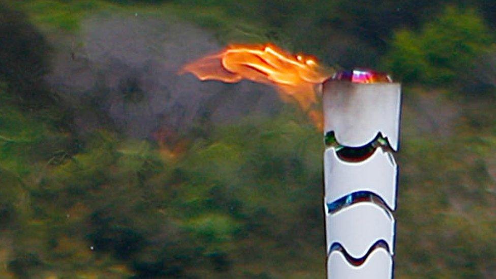 Olympic Flame torch relay at Solimoes River in Iranduba city