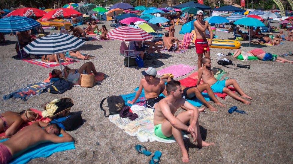 tourists on beach