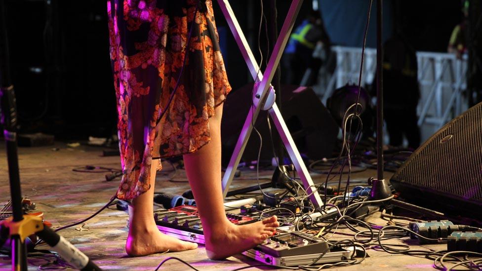 A performer on stage at Glastonbury