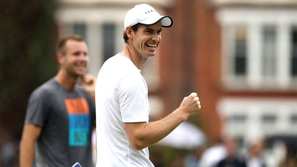 Andy having fun training at Queen's Club on June 19, 2019 in London