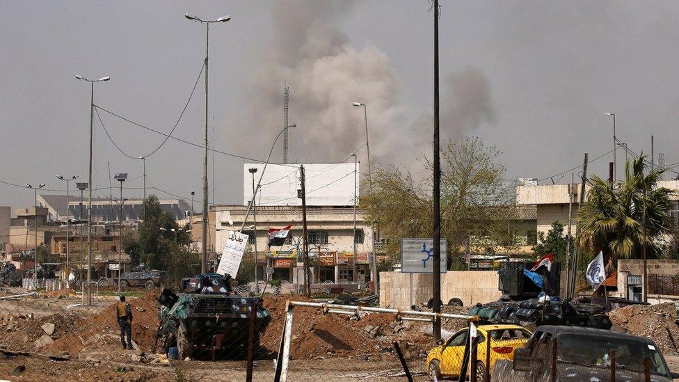 Smoke rises from Mosul's old city during a battle against Islamic State militants (29 March 2017)