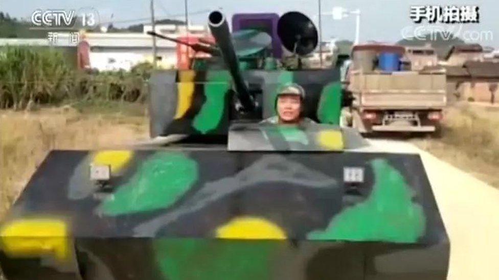 Mr Huang and his homemade tank