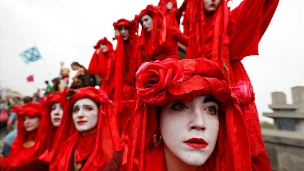 Demonstrators perform