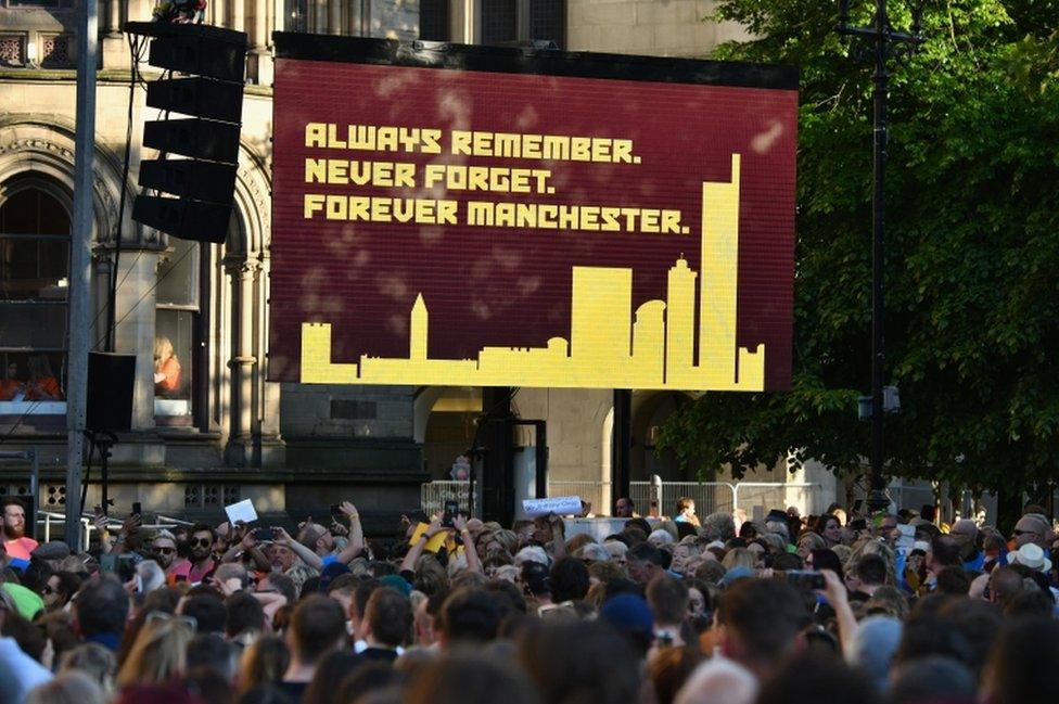 Sign reading 'Always Remember, Never Forget, Forever Manchester'