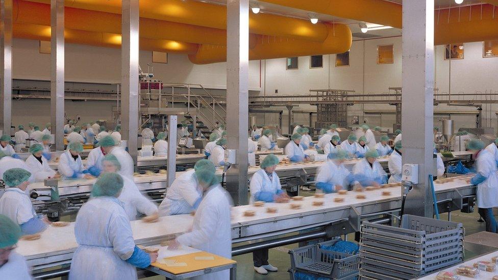 Workers in a Greencorp sandwich factory