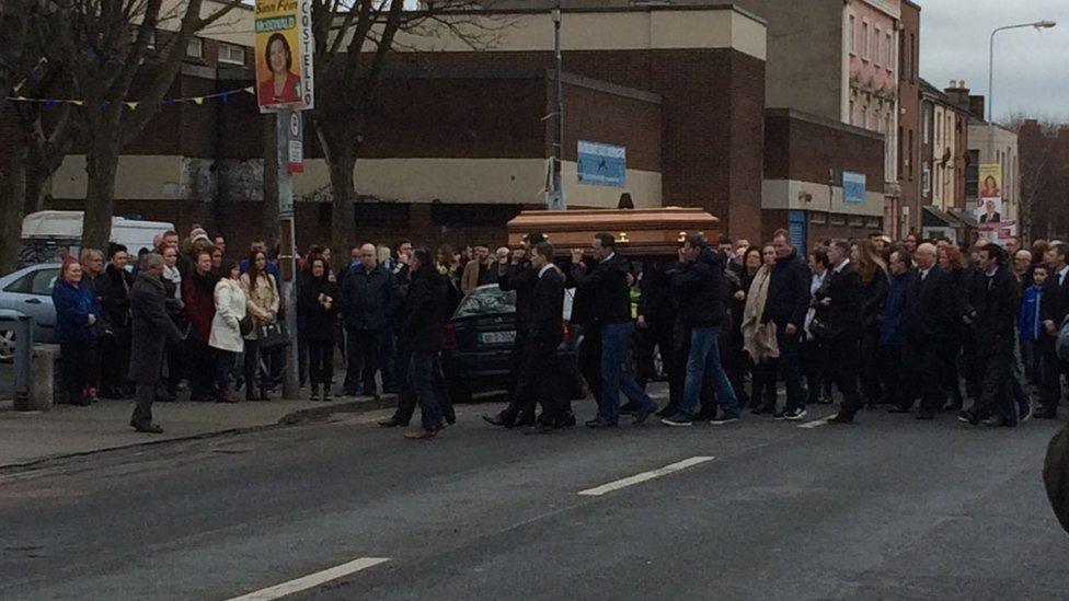 Mourners carry the coffin of Eddie Hutch at his funeral in Dublin