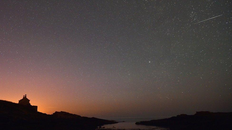 Perseid meteor shower over the Bathing House at Howick in Northumberland, August 13th 2015