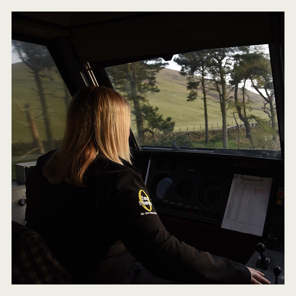 Heather Waugh drives a Class 90 locomotive through lowland Scotland