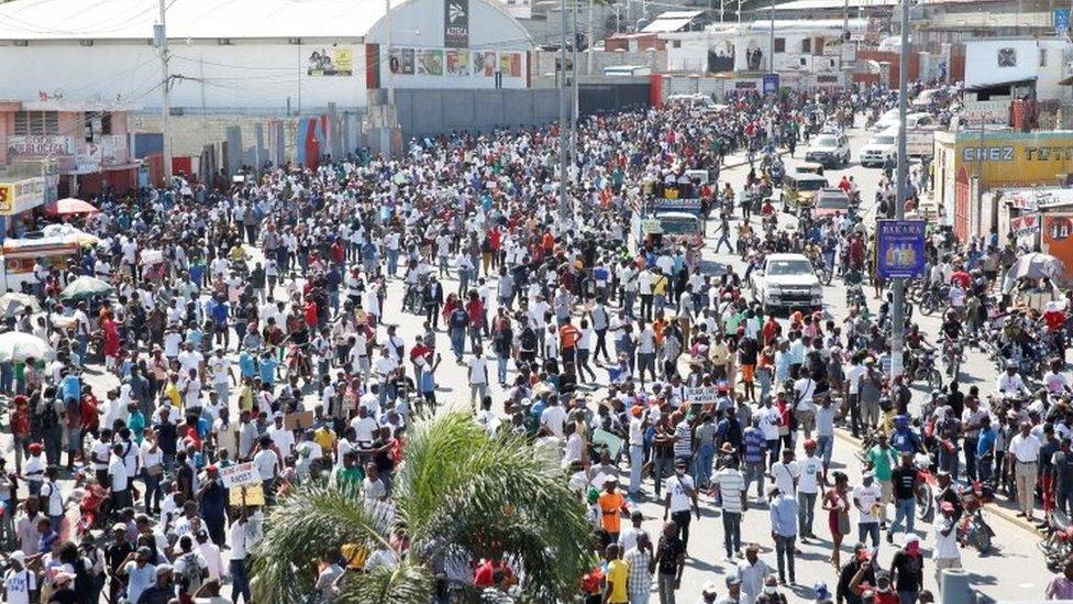 Demonstrators take part in a protest against Haiti"s President Jovenel Moïse, in Port-au-Prince, Haiti February 14, 2021.