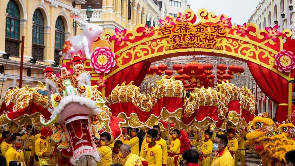 A 238m-long dragon dance passes by Leal Senado Square during celebrations on the first day of the Chinese lunar new year in Macau on January 22, 2023