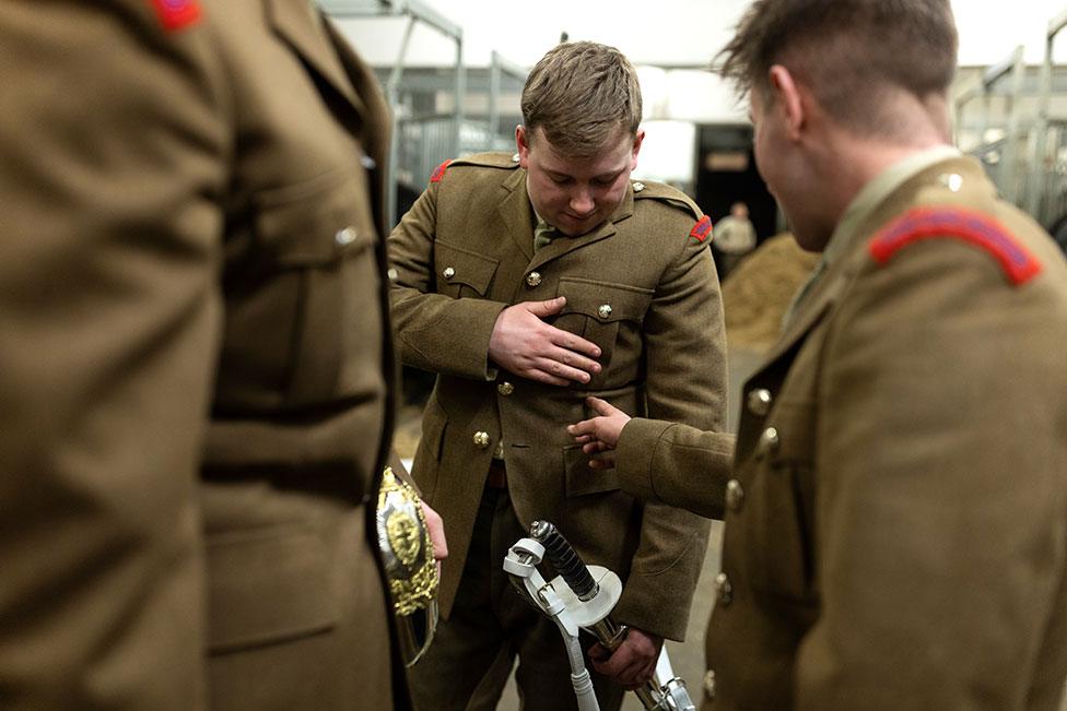 Before the midnight rehearsal, members of the Household Cavalry Mounted Regiment prepared at Hyde Park Barracks