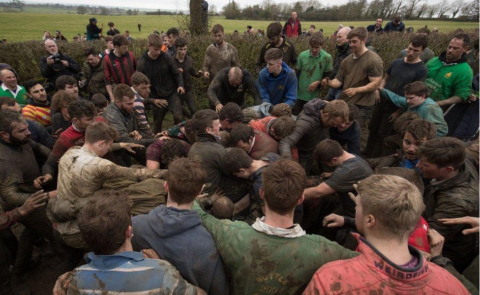 Competitors fight for the bottle