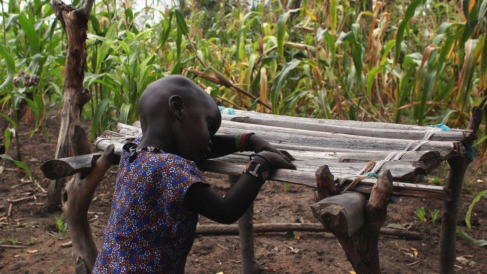 A girl who has fled her home in South Sudan - pictured near the town of Nyal in August 2018