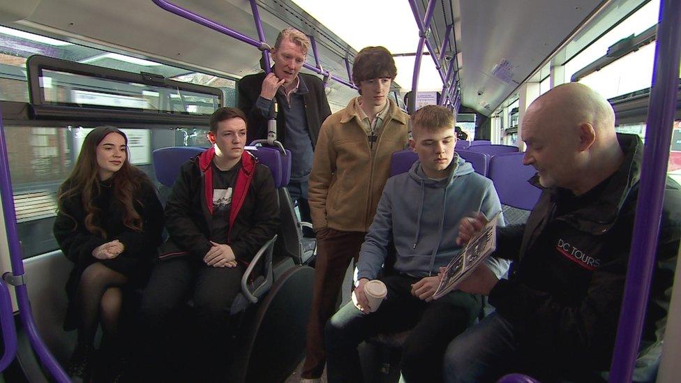 Group on glider bus belfast