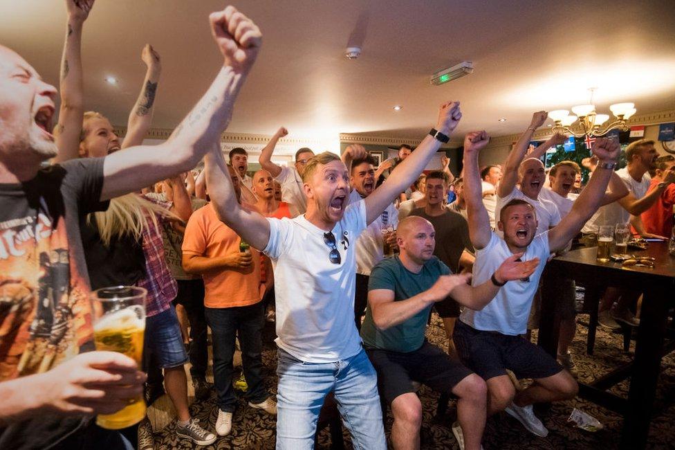 Fans in the The Lord Stamford pub in Manchester