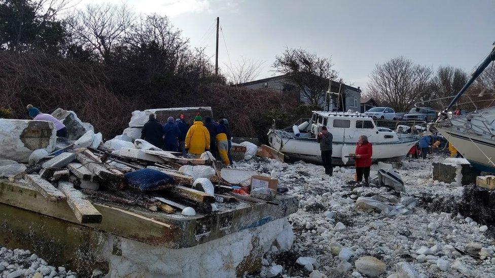 The clean-up operation at the marina in Holyhead