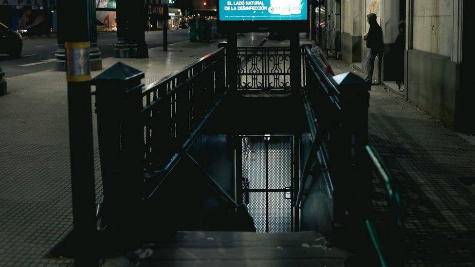 A man stands near a closed metro station in Buenos Aires. Photo: 9 May 2024