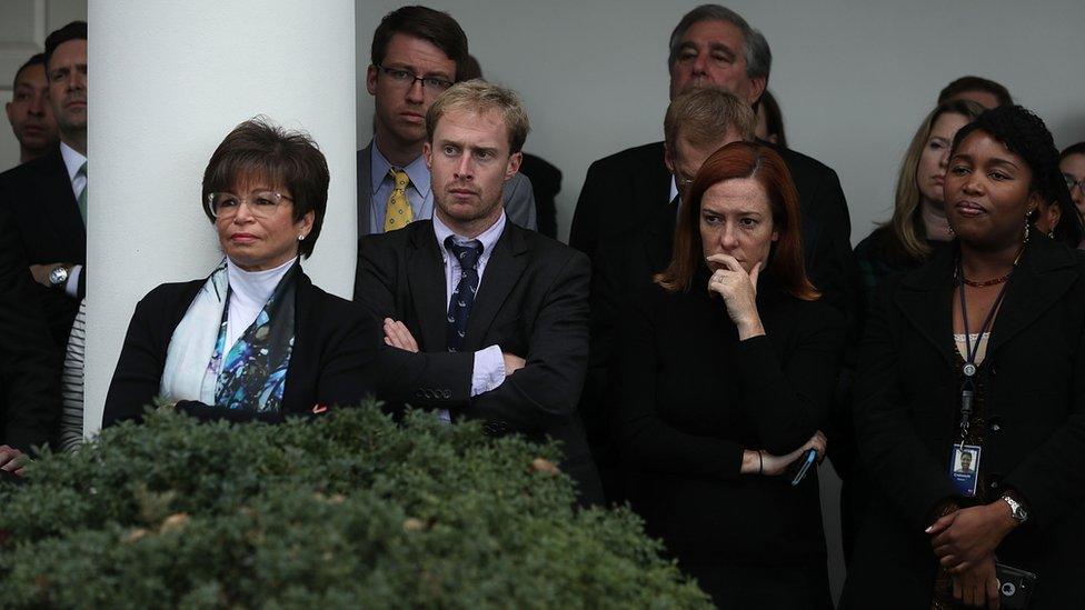 Staff members listen as U.S. President Barack Obama, not pictured, speaks in the Rose Garden at the White House in Washington, D.C., U.S., on Wednesday, Nov. 9, 2016