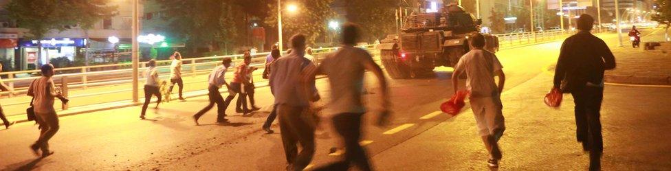 People try to take over a tank in Ankara in the early hours of 16 July