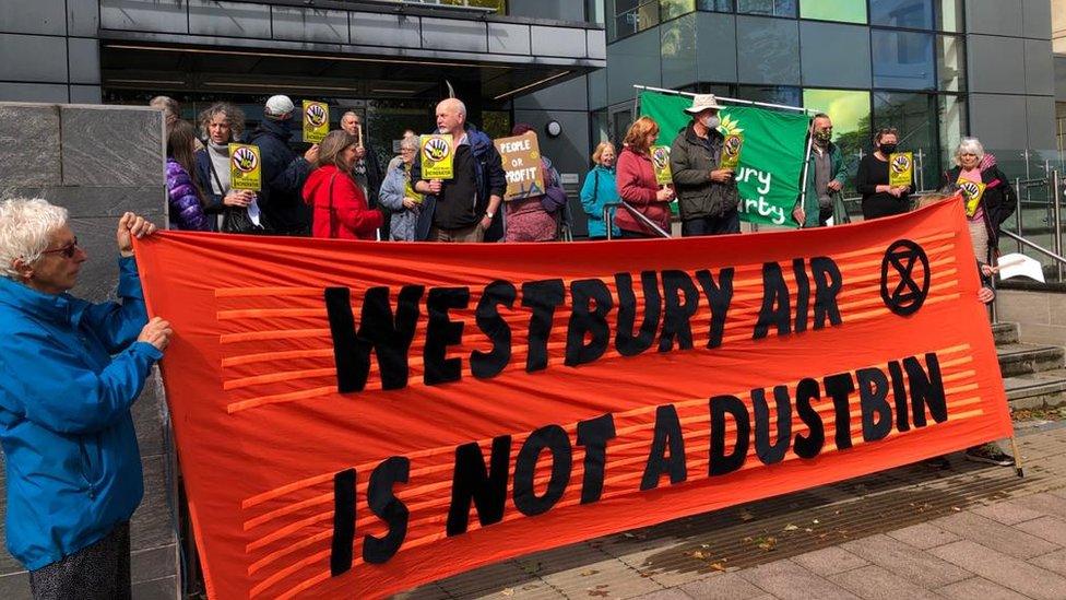 Protesters gathered outside the County Hall ahead of the meeting