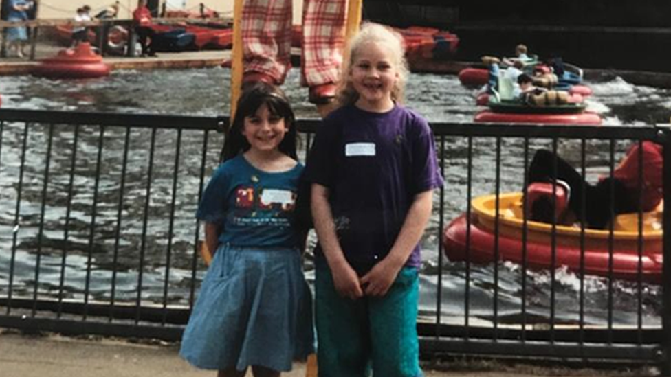 Lucy Elliott with her friend Christine Sansford at the park as a child