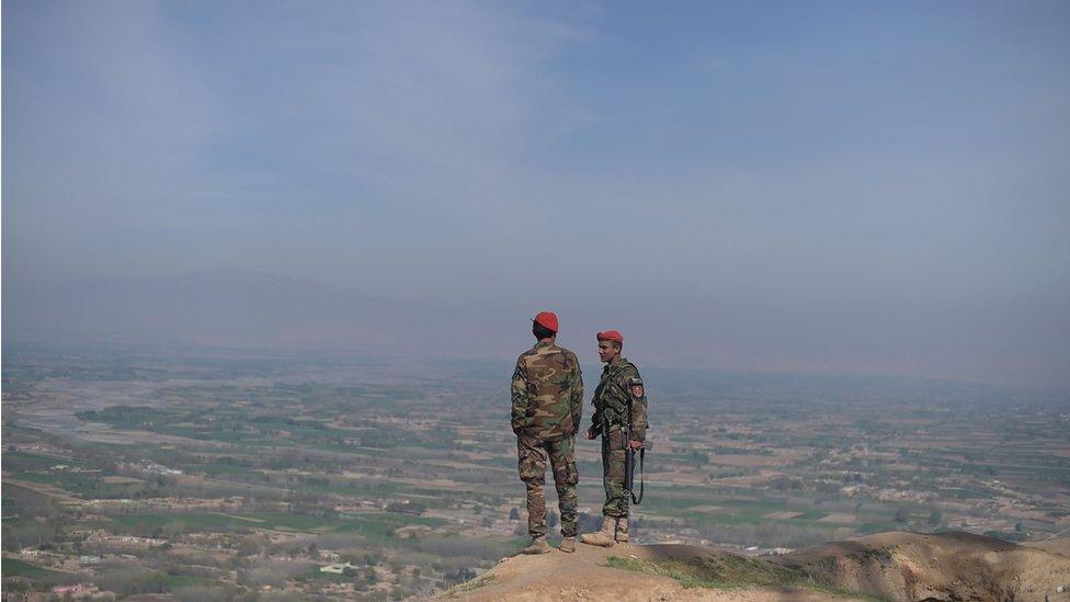 Afghan National Army soldiers keep watch in Dand-e-Ghori district in Baghlan province in March