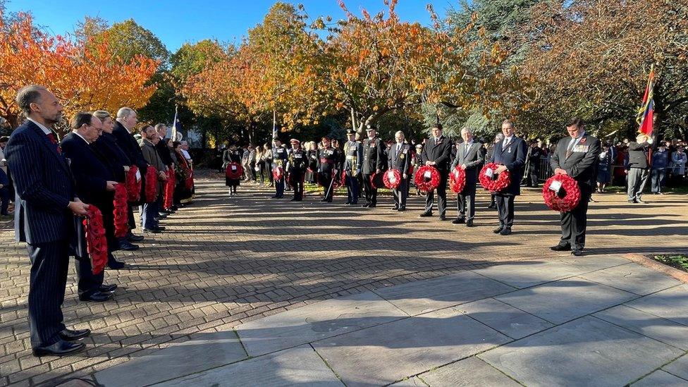 People attending a Remembrance Sunday service in Cardiff