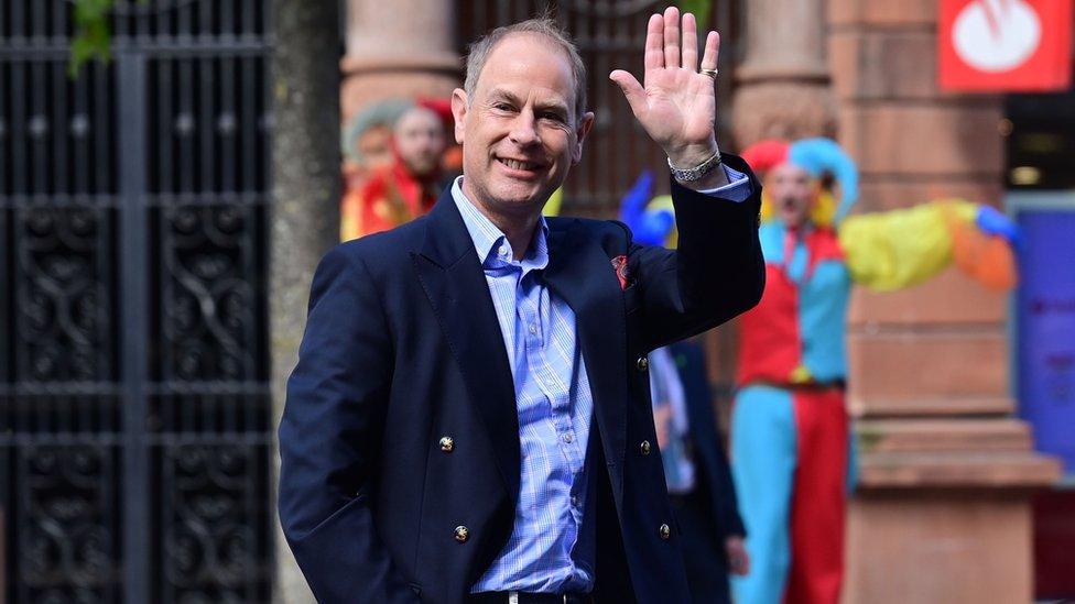 Prince Edward waves to crowds