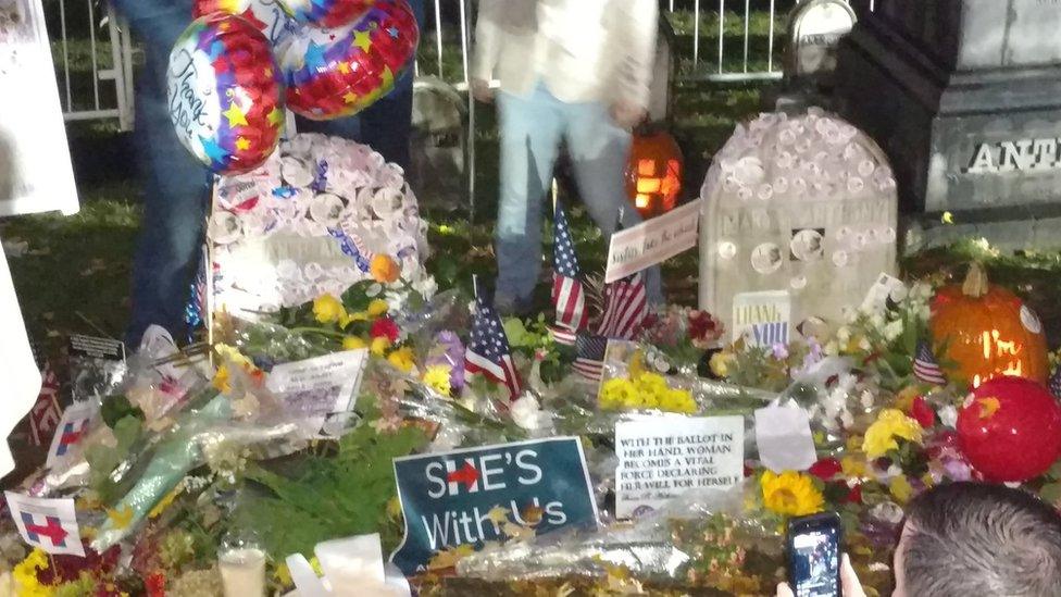 Stickers and tributes at the grave of Suffragette Susan B Anthony