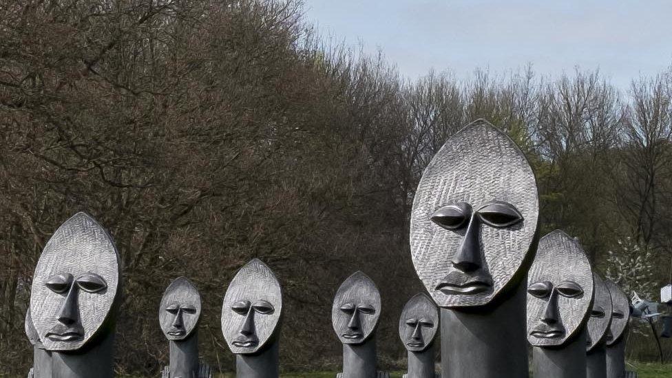 Black and Blue: The Invisible Man and the Masque sculpture by Zac Ove