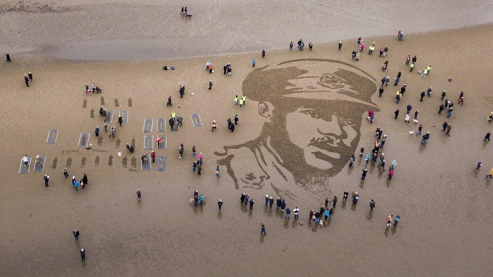 A picture of the British Army's first black officer Walter Tull is seen on Ayr Beach